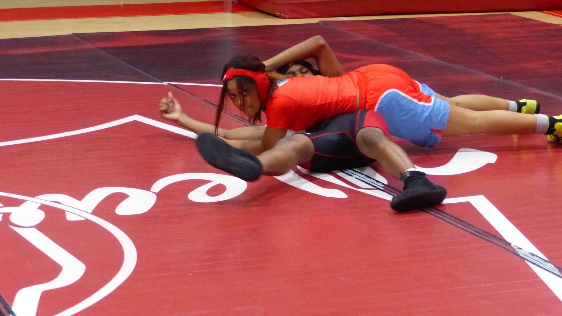 Photo: Kenwood Academy's Leah Morris wrestles on boys team